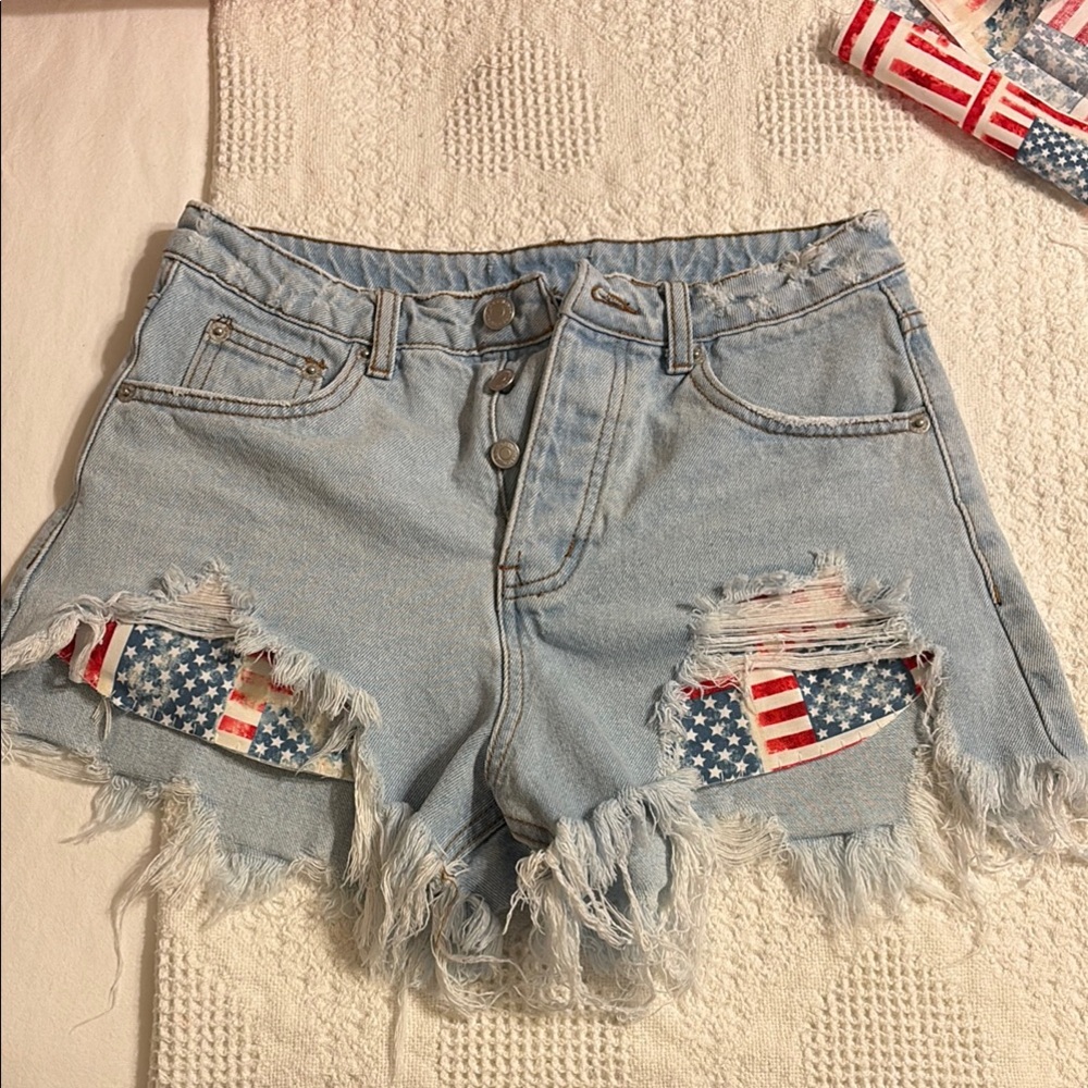 DAISY DUKES Denim Shorts with raw fringe USA American Flag pockets 28”